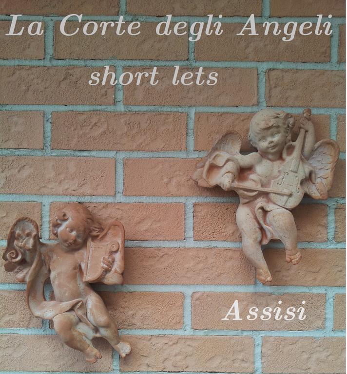 La Corte Degli Angeli Locazioni Turistiche Ассізі Номер фото